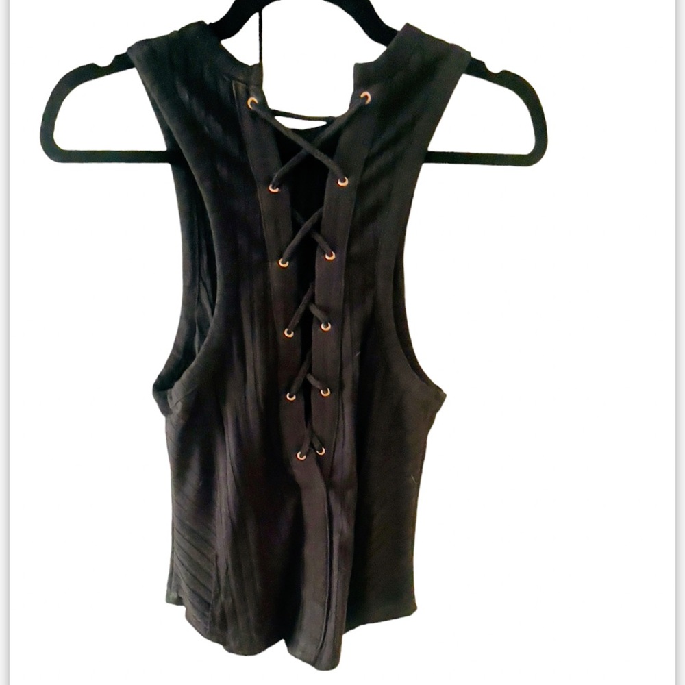 Free People Black Tank with Cross stitching up the back.